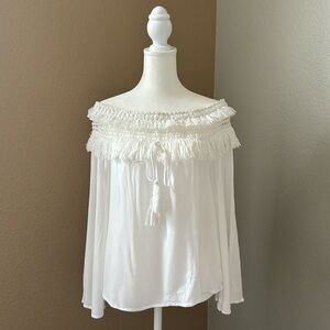 Off the shoulder white blouse with fringe